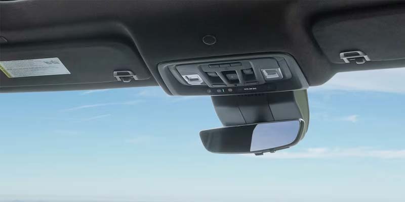 A close-up view of a car's rearview mirror