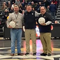 Curtis Ballard at halfcourt of a Jasper High School basketball game