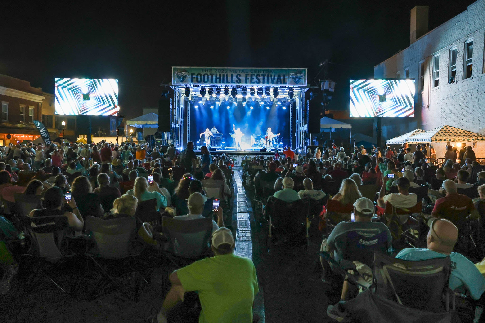 A band putting on a performance at the Foothills Festival